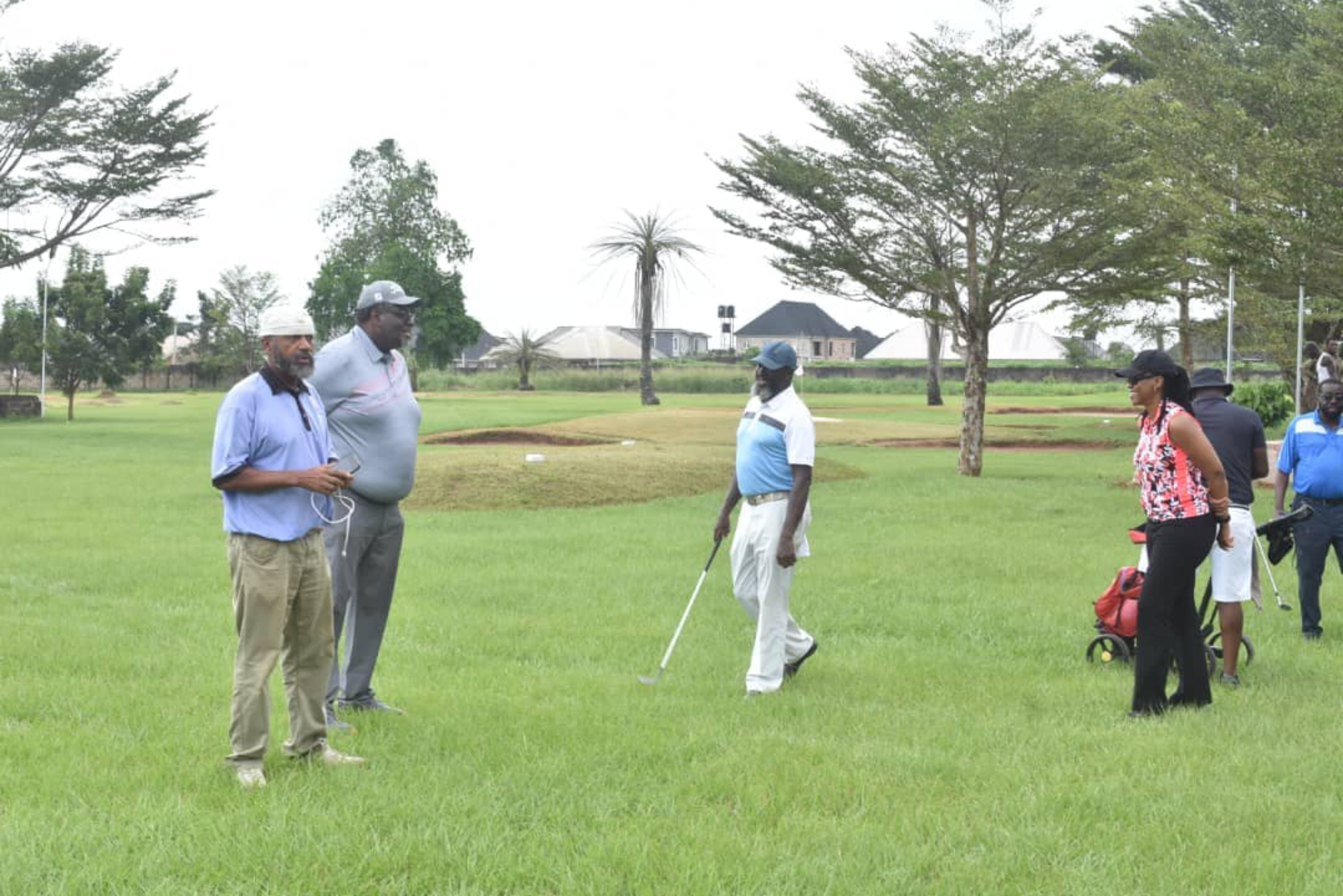 a group of golfers at Dexdee Resort