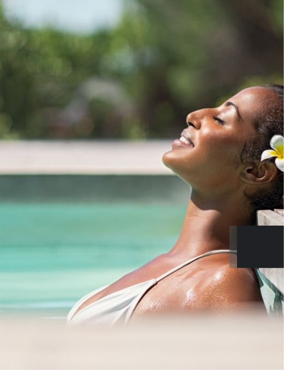 a lady relaxing in a swimming pool